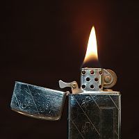 200px-Zippo-Slim-1968-Lit.jpg