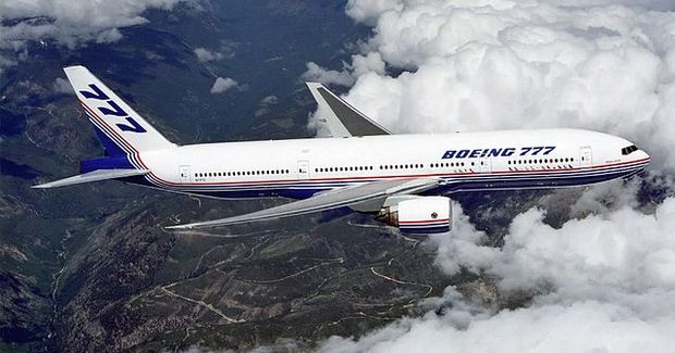 Boeing_777_above_clouds__crop.jpg