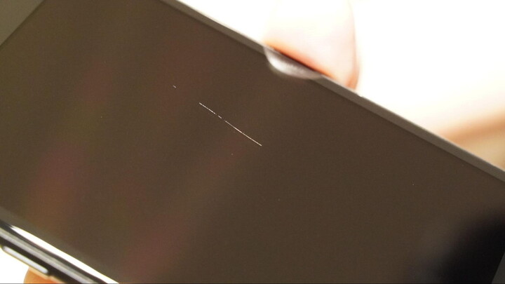 フィルム貼り付け後の状態（ところどころにある白くて小さいものは、フィルムの上にのったホコリ）